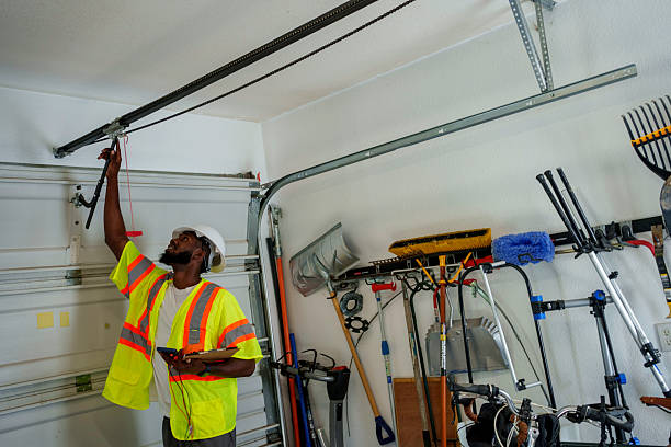 Professional Garage Door Panel Replacement technician working in Earlham, IA