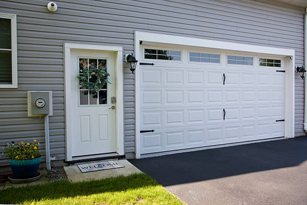 24/7 Emergency Garage Door Panel Replacement experts in Earlham, IA